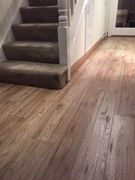 Laminate flooring on the bottom of the stairs