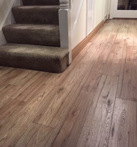 Laminate flooring on the bottom of the stairs
