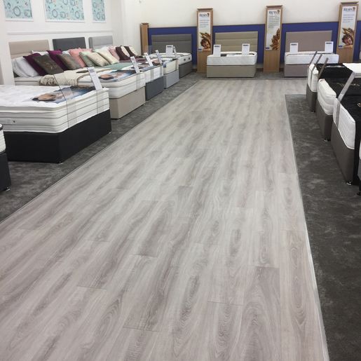 Vinyl flooring installed in a mattress shop